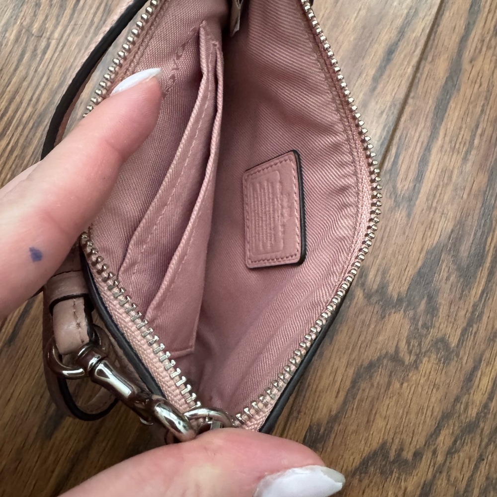 Coach light pink wristlet